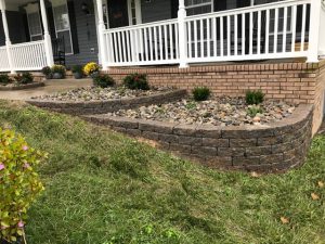 retaining wall in front of house