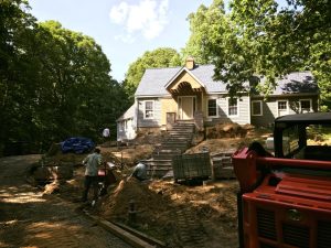 Adding walkway, stairs, and retaining walls to house