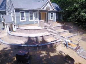 walkway, stairs and retaining wall being built