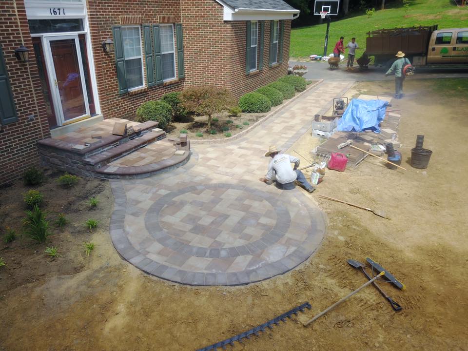 front walkway with circular patio area at end