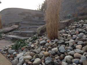stone pebbles with stairs in background