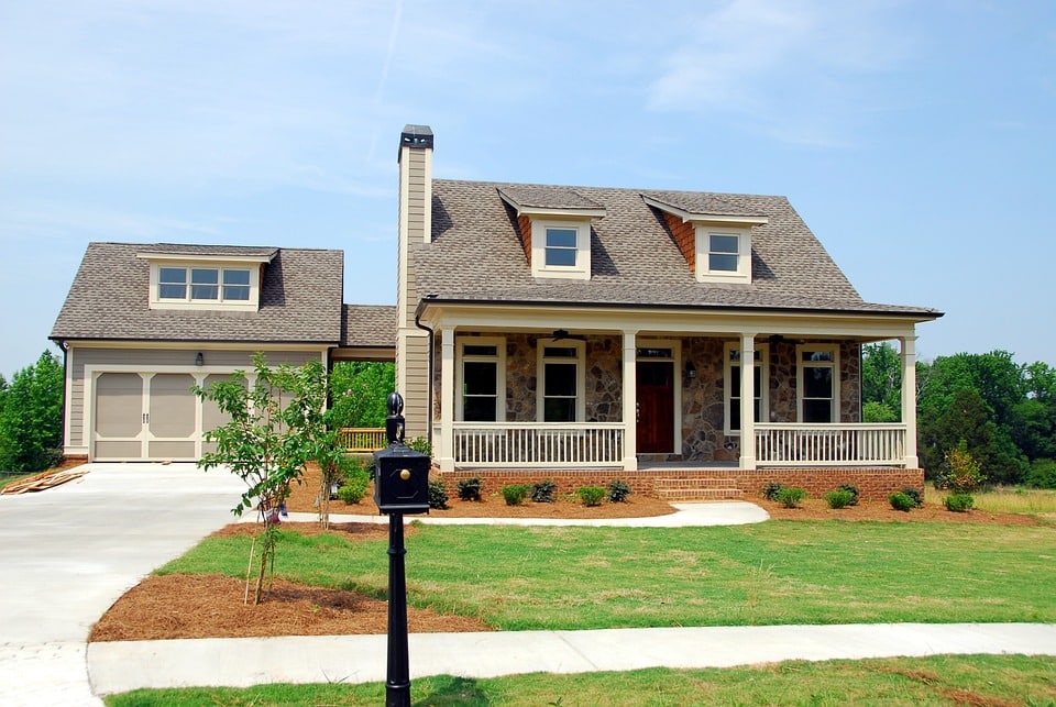 stock photo of front of house with driveway